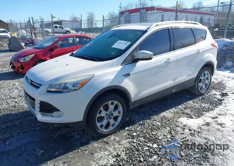 2014 Ford Escape Titanium z USA, uszkodzony, nr VIN 1FMCU0J99EUA91053